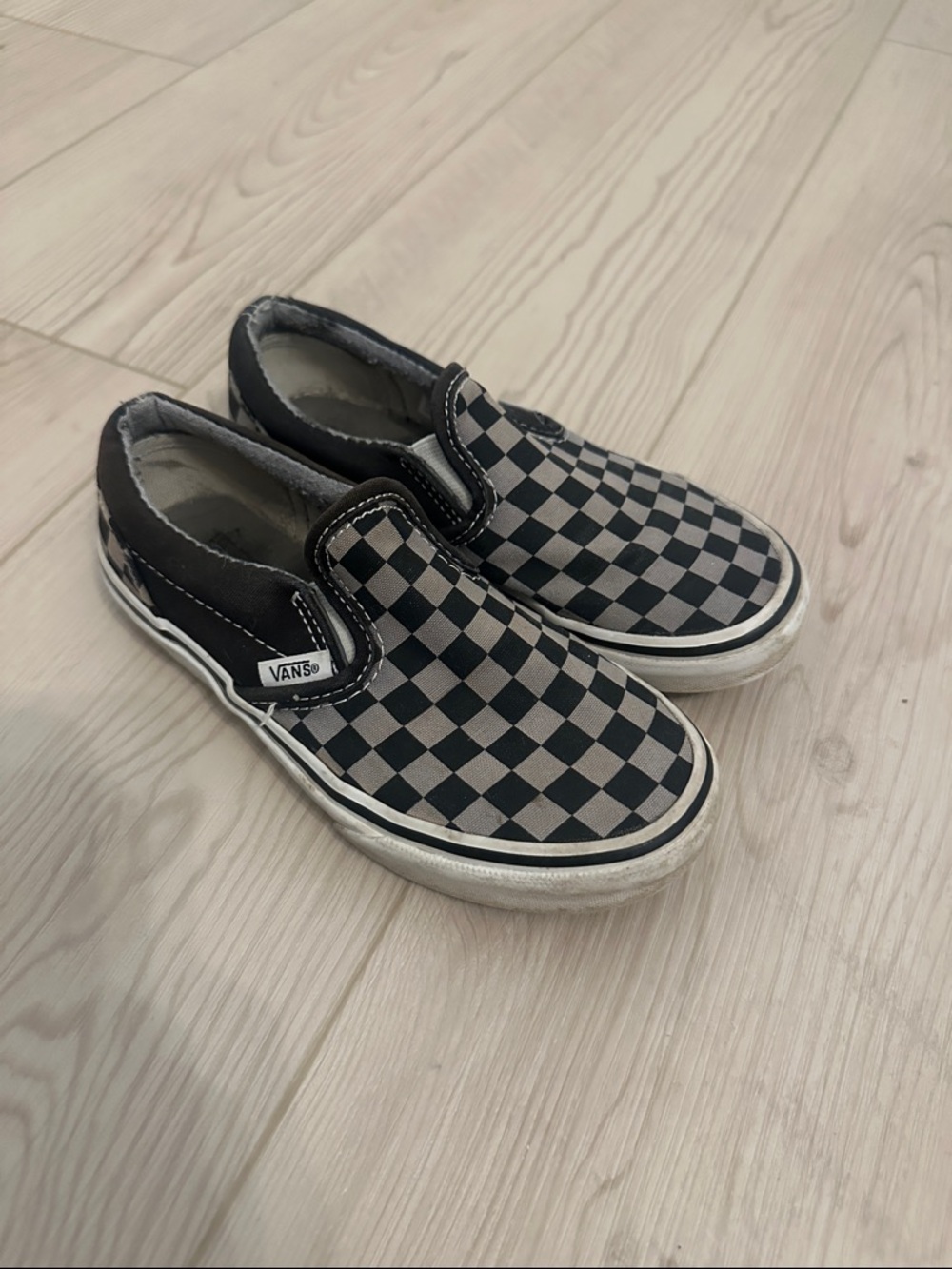 Vans Kids Black and Gray Checkerboard Slip-On Sneakers